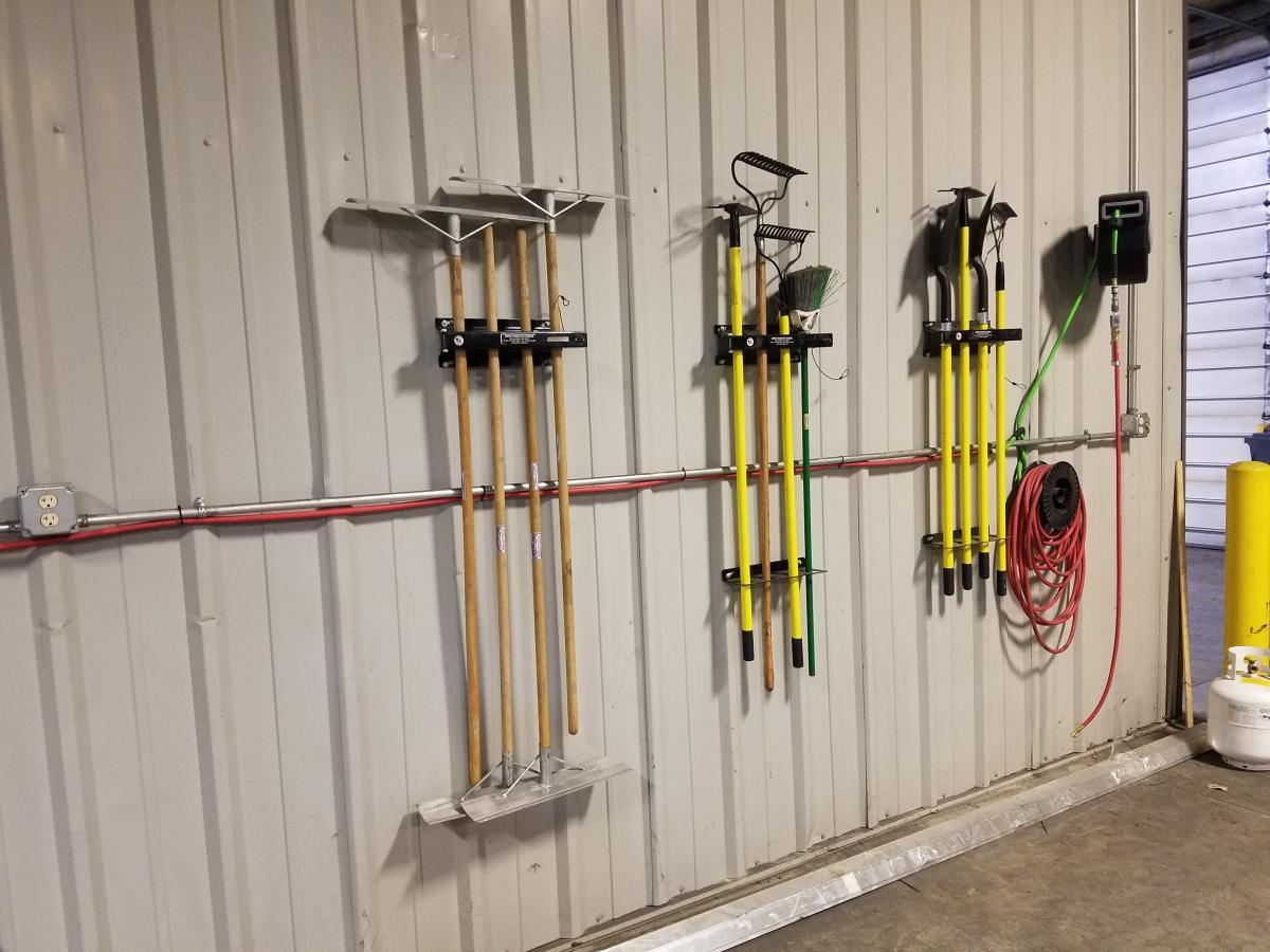 shovel rack, rake rack, tool rack, broom rack, yard tool holder, landscaping tool holder, landscaping tool rack, landscape tools, landscape shop