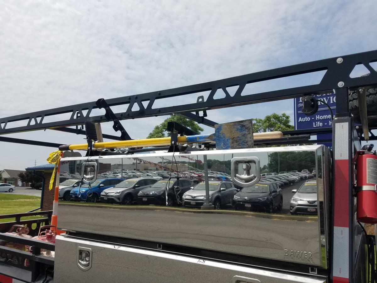 rake rack, tool rack, tool holder, landscaping tool holder, broom rack, truck, trailer, trailer tool rack