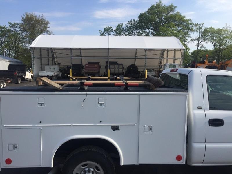 shovel rack, rake rack, tool rack, tool holder, tow truck, trailer, trailer tool rack